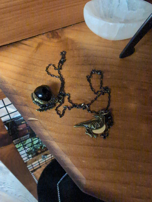 Crow divination necklace